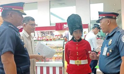 PNP fines guard wearing costume